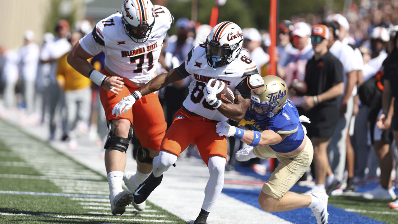 Bowman's 5 TD Passes Lead No. 13 Oklahoma St. Past Tulsa, 4510
